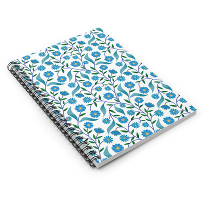 Floral Spiral Notebook with a white cover featuring a blue flower, green leaf pattern. Black double-loop wire coil binding enhances durability and ease of use, perfect for creativity and organization.