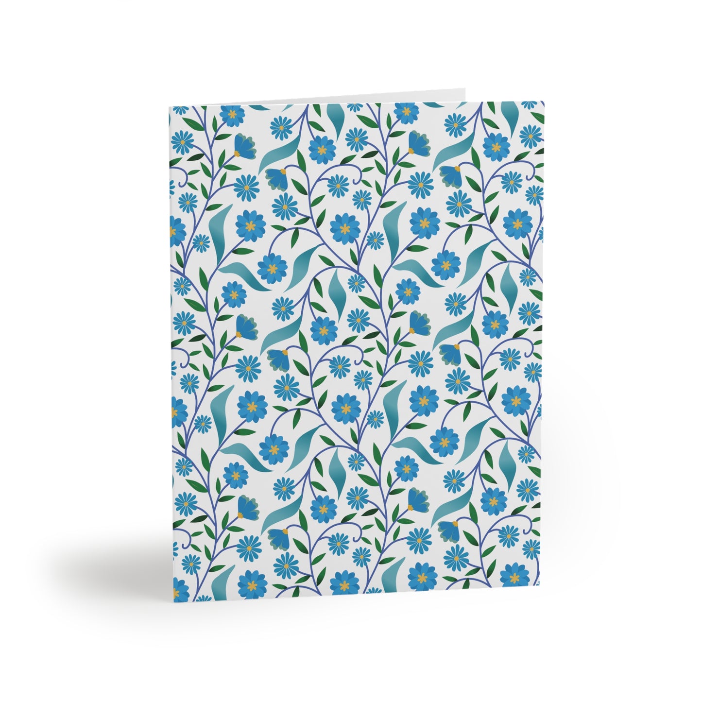 Floral Greeting Cards — Pack of 8/16/24 featuring a stylized botanical pattern with blue daisies and teal leaves, perfect for cheerful messages. Matte finish, includes white envelopes. Designed for joyful connections.