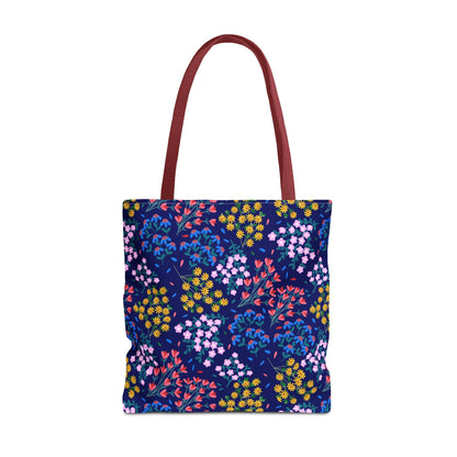 Midnight Garden Tote Bag features a dark blue floral pattern with burgundy straps. Its structured design and reinforced handles make it perfect for daily use, embodying FireBrook's blend of style and practicality.
