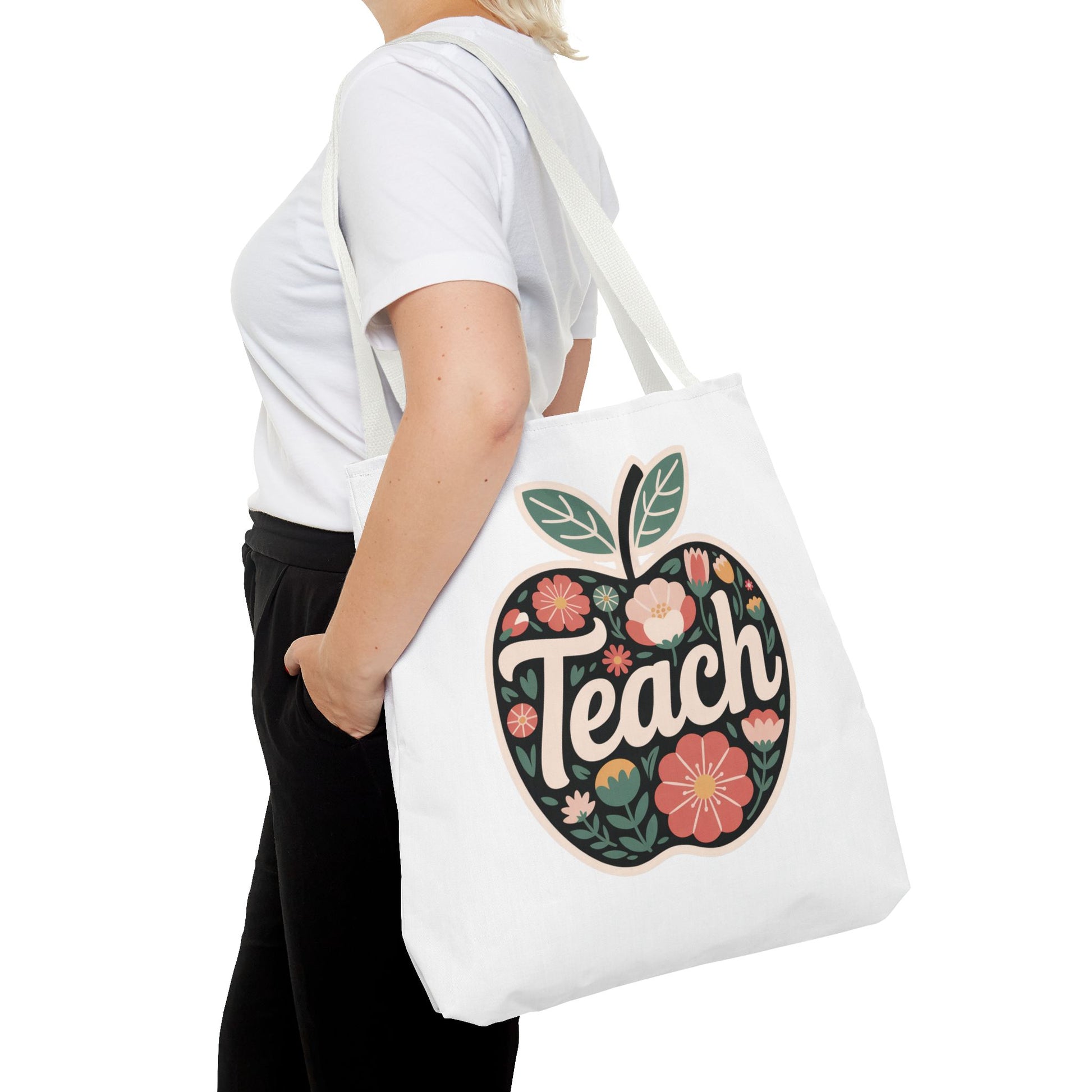 Floral Apple Tote Bag - Hand-Drawn Pastel-Colored Design with 'TEACH'; a cheerful, cozy accessory perfect for educators and nature lovers, featuring reinforced handles and boxed corners for durability and space.