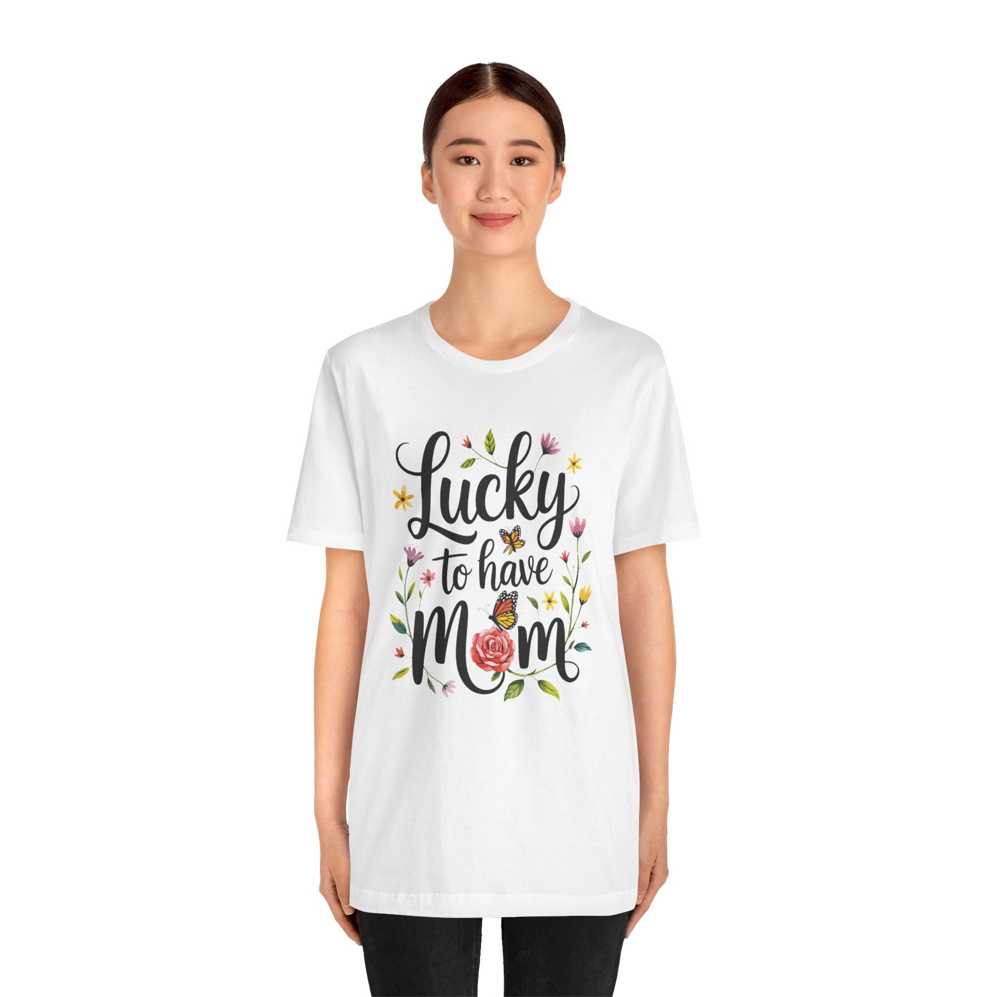 Lucky to Have Mom Mother's Day Bella+Canvas Unisex T-Shirt featuring a black text and floral graphic, highlighting the phrase 'Lucky to have mom,' worn by a woman, showcasing comfortable, stylish apparel.