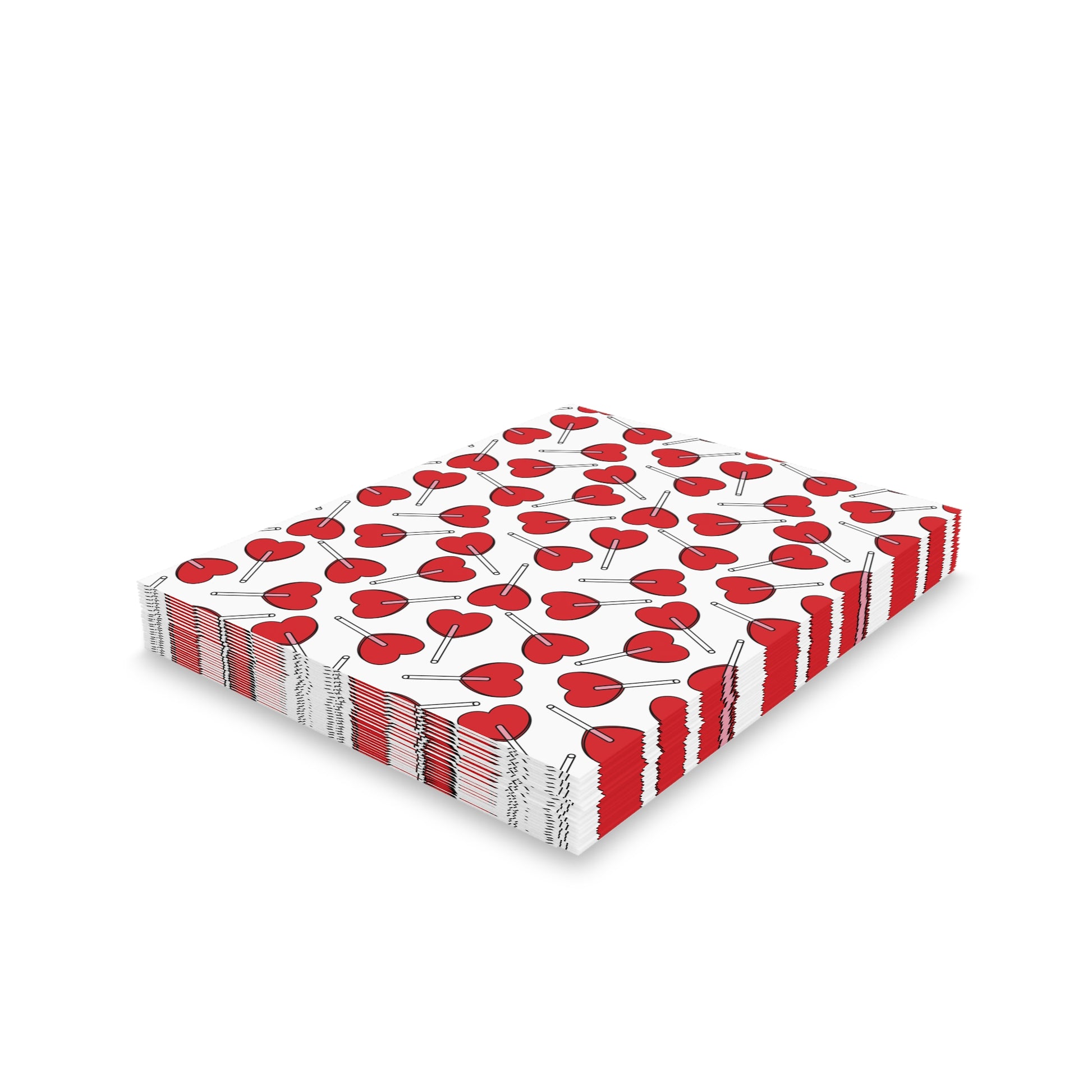 Love Greeting Cards — Pack of 8/16/24: A neat stack of square paper napkins featuring a charming pattern of red heart-shaped lollipops on a white background, capturing FireBrook Designs' cheerful and uplifting essence.