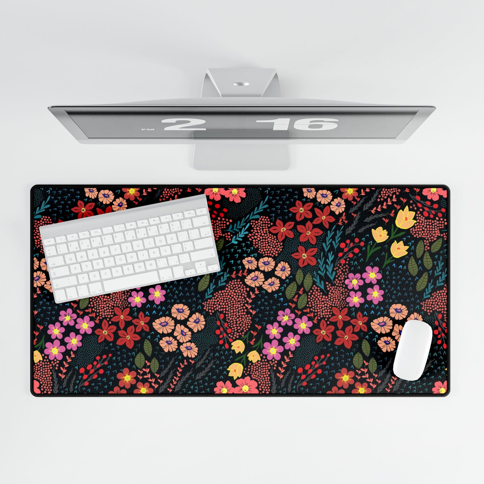 Desk Mat - Midnight Garden Floral Pattern: A vibrant floral desk pad featuring bold nature-inspired designs, with a wireless keyboard and mouse on a minimalist white desk setup, enhancing your workspace with color.