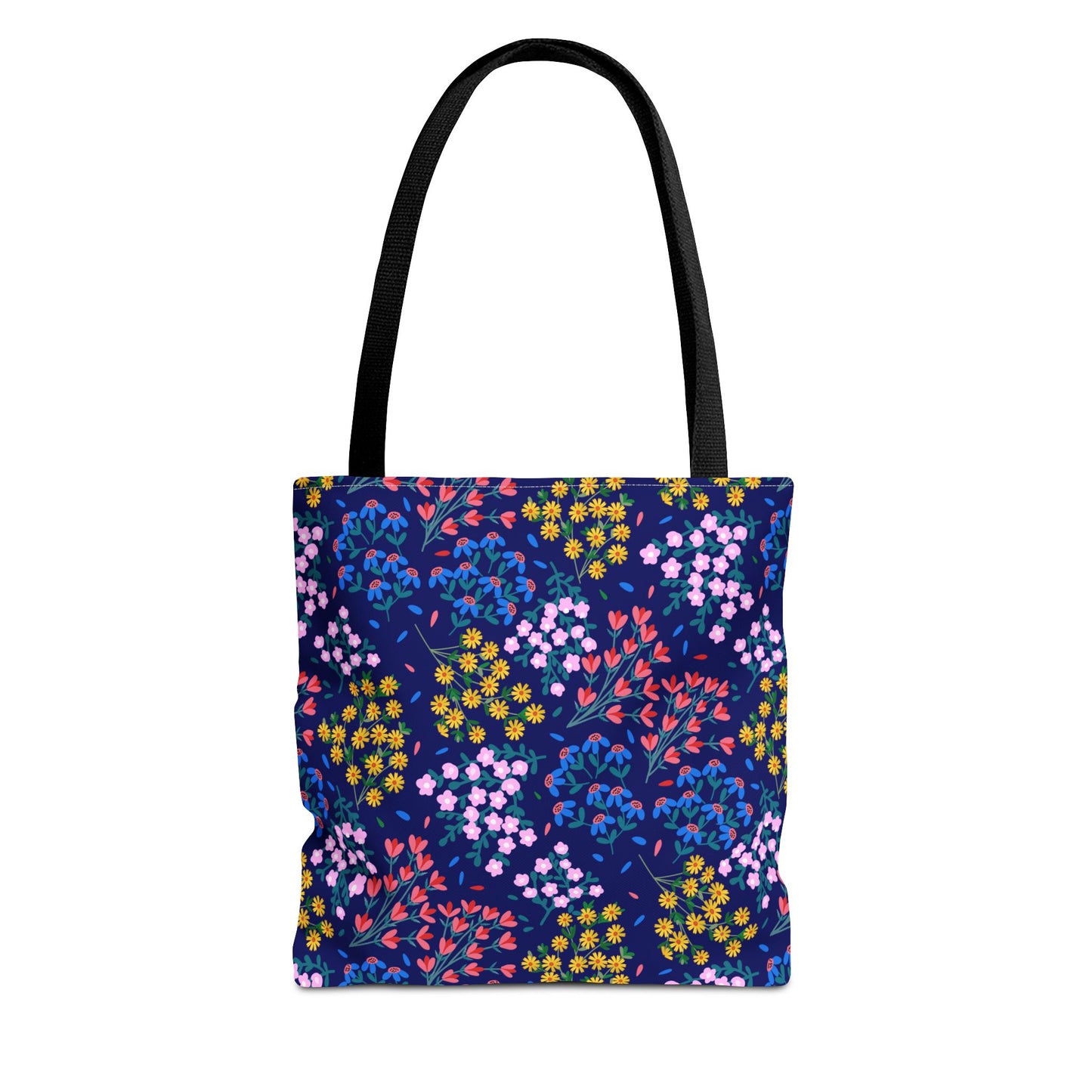 Midnight Garden Tote Bag features a dark navy-blue floral pattern with vibrant yellow, pink, red, and blue flowers. Equipped with sturdy black handles, it embodies FireBrook Designs' blend of style and practicality.