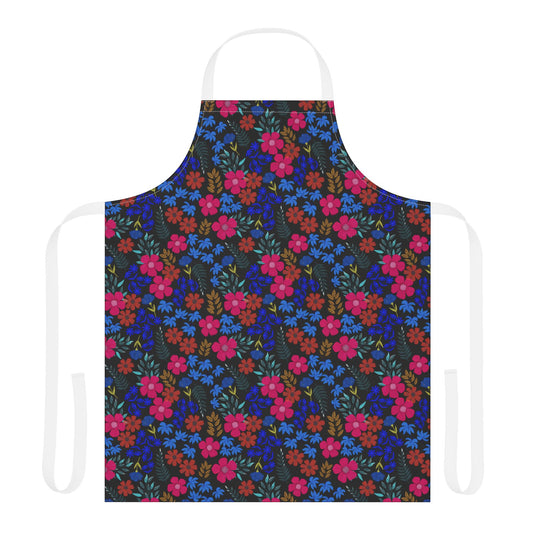 Apron Floral Design: A vibrant kitchen apron with a dense floral pattern in pink, red, blue, and mustard-yellow, featuring solid-white neck and waist ties, crafted for comfort and style.