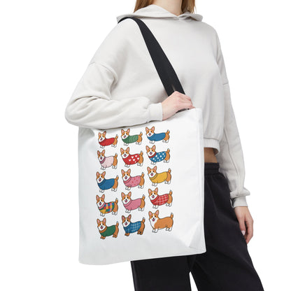 Cheerful Corgi Cartoon Style Dog Lover Tote Bag features adorable corgis in colorful outfits, designed for dog enthusiasts. Made from durable polyester, this whimsical accessory is perfect for everyday use.