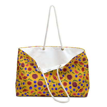 Yellow Floral Weekender Bag — Bright Boho Travel Tote with vibrant floral print and sturdy white rope handles, designed for joyful journeys with a roomy, stable interior and elegant gold-tone accents.