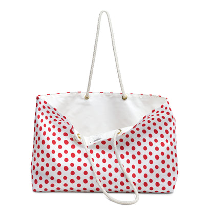 Weekender Bag - Red (small) Polka Dots features a playful retro design with rope handles and a spacious interior, perfect for stylish weekend trips and adding a cheerful touch to travel.