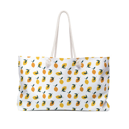 Lemon Print Weekender Bag - A vibrant tote with a playful lemon design, ideal for beach trips or gym visits. Spacious and functional, it embodies FireBrook Designs' ethos of style and positivity.