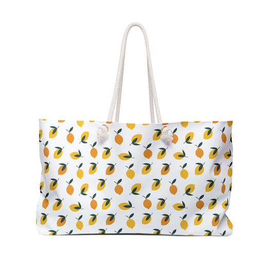 Lemon Print Weekender Bag - A vibrant tote with a playful lemon design, ideal for beach trips or gym visits. Spacious and functional, it embodies FireBrook Designs' ethos of style and positivity.