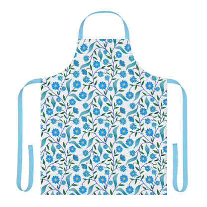 Apron Floral Design: A stylish white apron with a blue floral pattern, featuring light-blue neck and waist ties. Made from soft polyester canvas, perfect for cooking and crafting with comfort and ease.