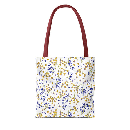 Floral Tote Bag with burgundy straps, featuring a golden yellow and blue botanical pattern on a white background. Ideal for joyful summer outings, embodying FireBrook Designs’ uplifting style.