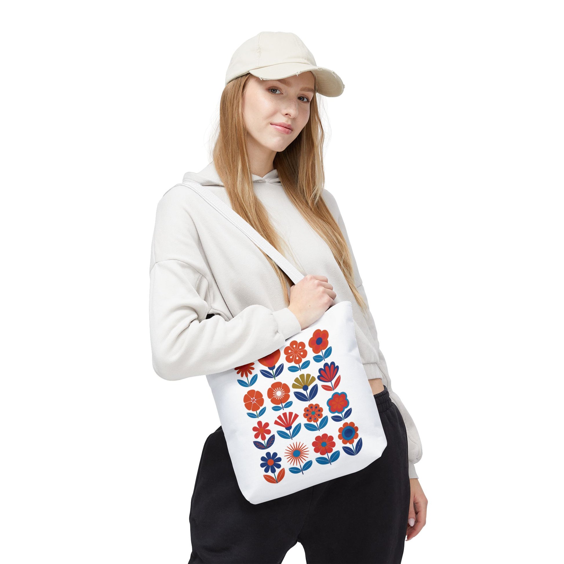 Floral Tote Bag showcasing mid-century modern floral patterns, designed for fashion-forward individuals. Durable polyester with reinforced handles, perfect for everyday essentials. Available in multiple sizes, embodying FireBrook Essentials' stylish and joyful ethos.