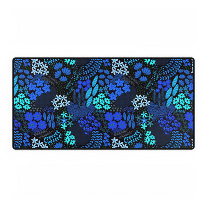 Blue Floral Desk Mat with a stitched black border, featuring hand-drawn florals and elements in blue and turquoise on a dark background, offering elegance and smooth mouse gliding for a joyful workspace.