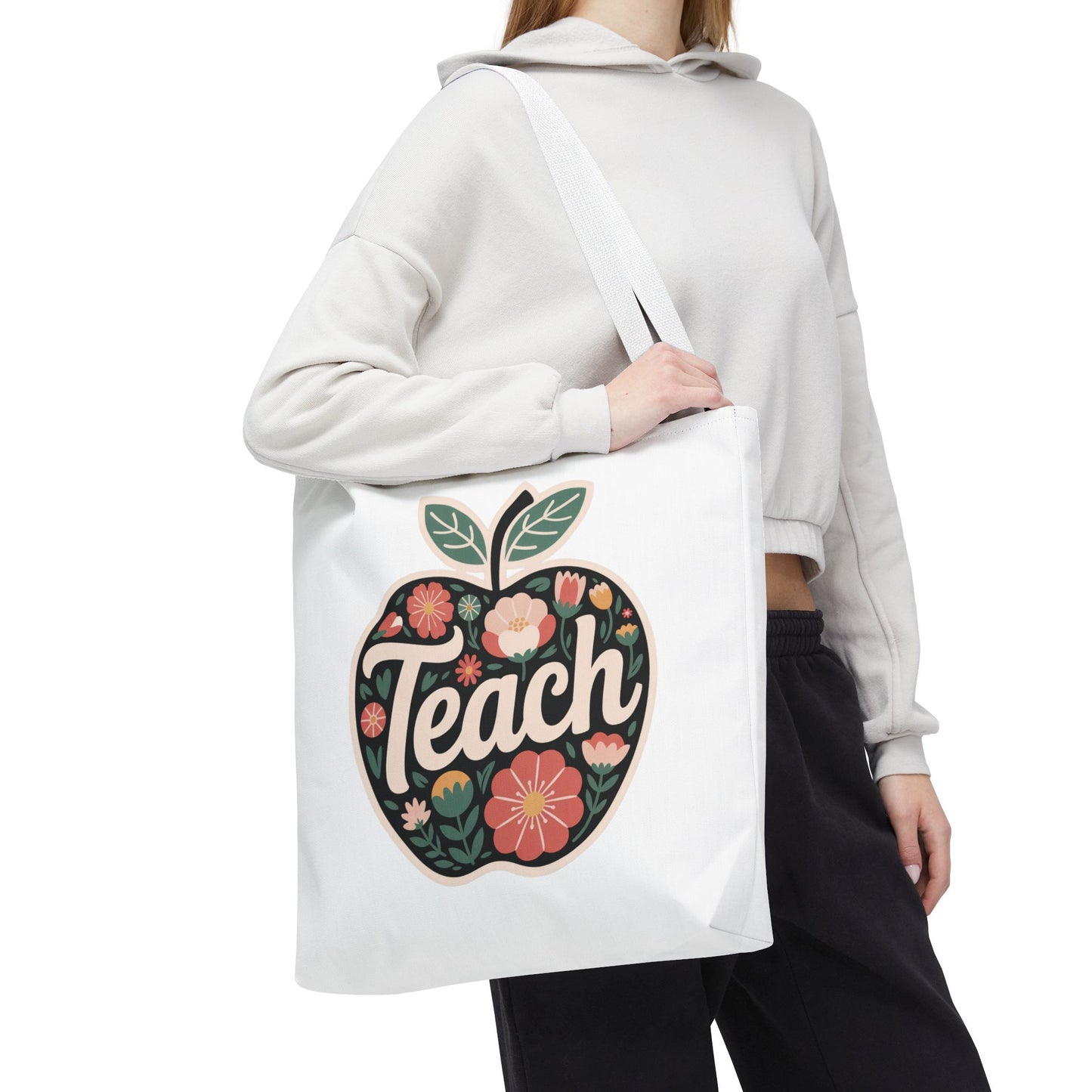 Floral Apple Tote Bag - Hand-Drawn Pastel-Colored Design with 'TEACH' features an apple-shaped tote adorned with vibrant floral illustrations, perfect for educators and nature lovers, available in multiple sizes and handle options.