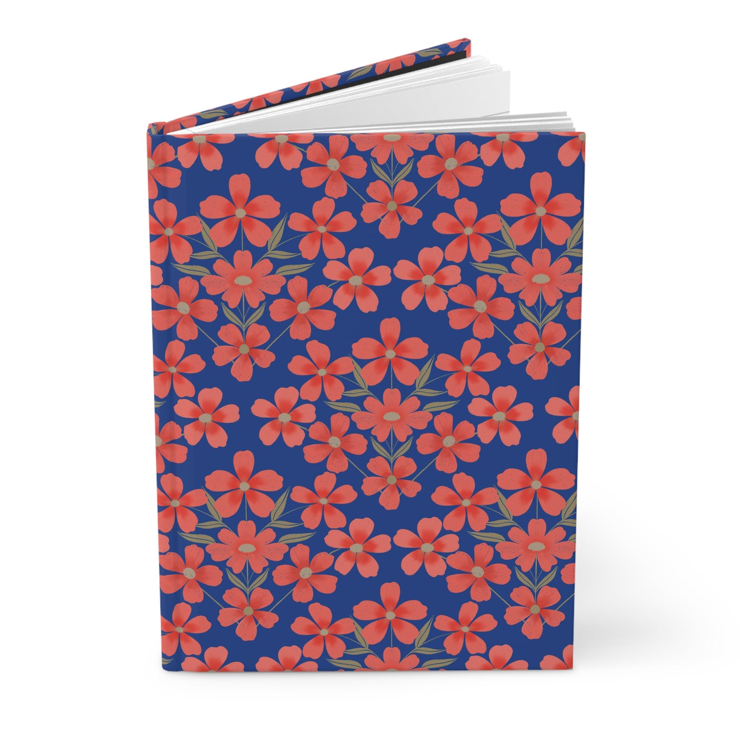 HARDCOVER JOURNAL, MATTE, RULES, 5X7, SEWN BIND, CLEAN-TEAR PAGES features a deep blue cover with vibrant red-orange floral patterns, standing upright with slightly open, blank white pages visible.