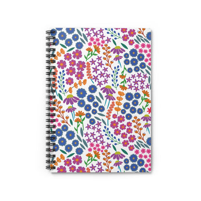 Floral Spiral Notebook featuring a vibrant, stylized floral pattern with blue, pink, orange, and purple flowers, and green leaves on the cover. Ideal for creative note-taking and journaling.