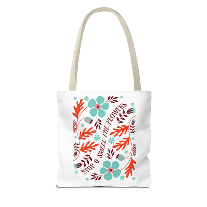 Stop and Smell The Flowers Tote Bag with floral design, featuring durable polyester body and reinforced handles, ideal for carrying essentials while spreading positivity.