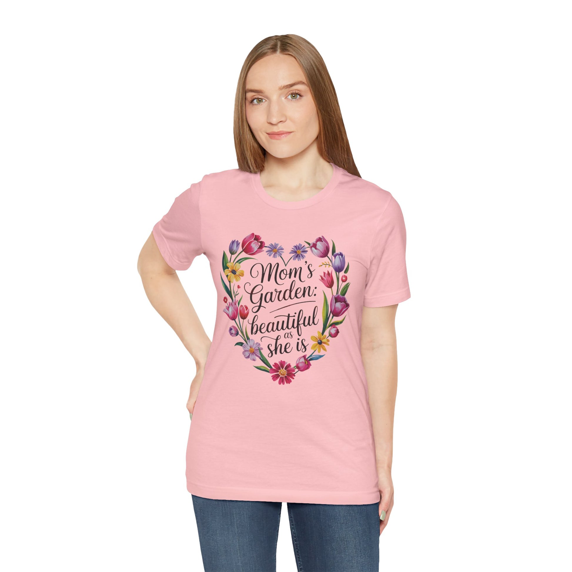Mom's Garden is as Beautiful as She Is Mother's Day Comfort Colors Unisex T-Shirt worn by a woman, showcasing a floral heart design symbolizing love and appreciation. Ideal for celebrating special women.