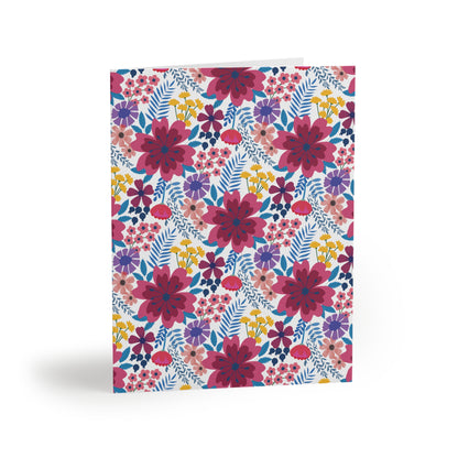 Floral Wildflower Greeting Cards — Pack of 8/16/24 features hand-drawn wildflowers in vibrant colors on a matte-finish card, conveying fresh springtime energy. Perfect for heartfelt messages, with matching white envelopes.
