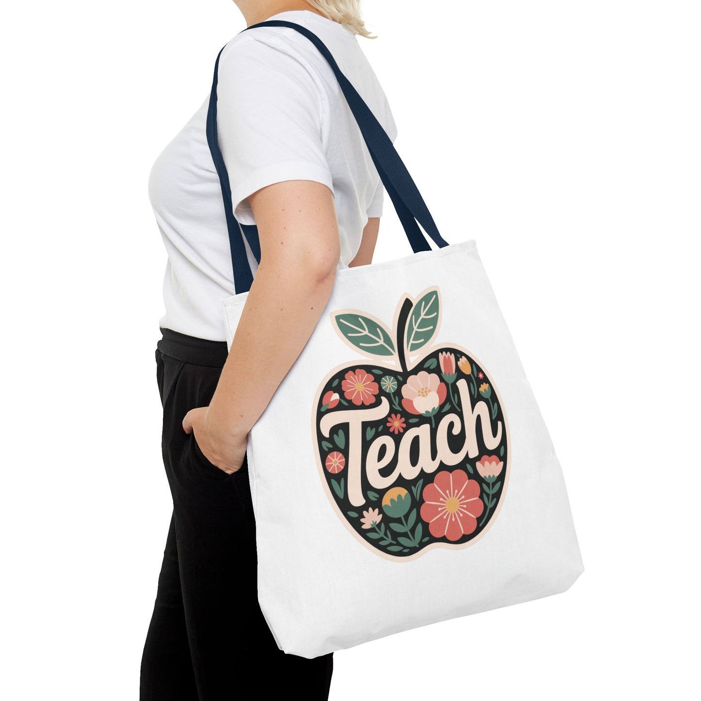 Floral Apple Tote Bag - Hand-Drawn Pastel-Colored Design with 'TEACH', showcasing a cheerful apple shape adorned with delicate floral illustrations, ideal for educators and nature lovers, from FireBrook Essentials.