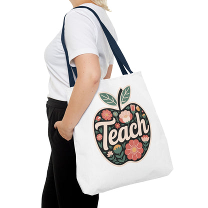 Floral Apple Tote Bag - Hand-Drawn Pastel-Colored Design with 'TEACH', showcasing a cheerful apple shape adorned with delicate floral illustrations, ideal for educators and nature lovers, from FireBrook Essentials.