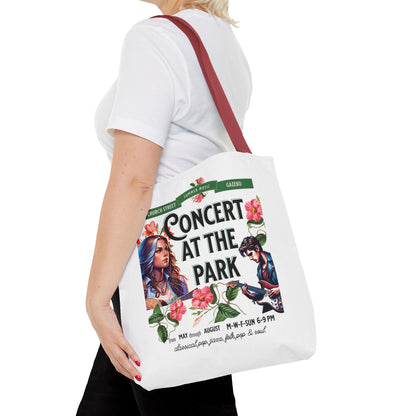 Concert At the Park Tote Bag featuring a lively concert scene, ideal for outdoor enthusiasts. Durable polyester with ample storage, perfect for summer outings.