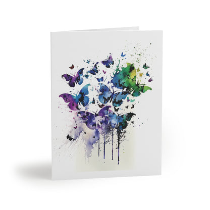 Butterfly Greeting Cards — Pack of 8/16/24, featuring an ethereal watercolor of tree trunks and butterflies in flight, embodying joy and elegance. Perfect for heartfelt messages, each card includes a matching envelope.