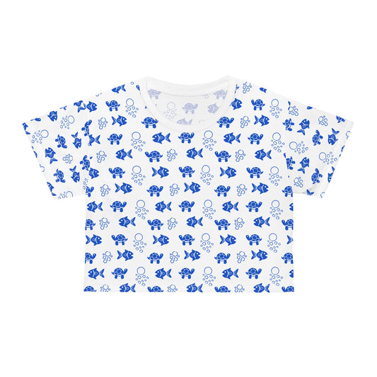 Cute Blue Fish Patterns for Summer Vibes Crop T-Shirt features playful fish and turtle designs, perfect for casual outings or beach days, reflecting FireBrook Essentials' joyful and stylish apparel ethos.