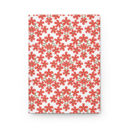 A HARDCOVER JOURNAL, MATTE, RULED, 5X7, SEWN BIND, CLEAN-TEAR PAGES - FLORAL GRID features a durable cover with a red floral pattern, offering crisp, tearable lined pages for flexible writing.