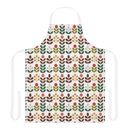 Flower Pattern Apron: A vibrant apron featuring a floral design, perfect for creative cooks and artists, offering comfort and protection with its polyester canvas and tie-back closure, enhancing any kitchen or studio setting.
