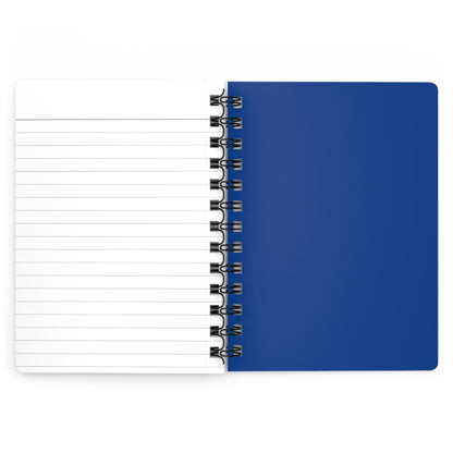 SPIRAL JOURNAL, DURABLE GLOSSY COVER, RULED, 5X7, PASTEL FIELD 002 features a blank lined page and a solid blue cover, bound with a sturdy black metal spiral, perfect for smooth writing.