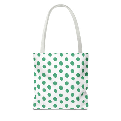 Green Polka Dots Tote Bag: A cheerful accessory featuring green polka dots and white handles, ideal for adding a vibrant touch to everyday outfits, perfect for spring and summer outings.