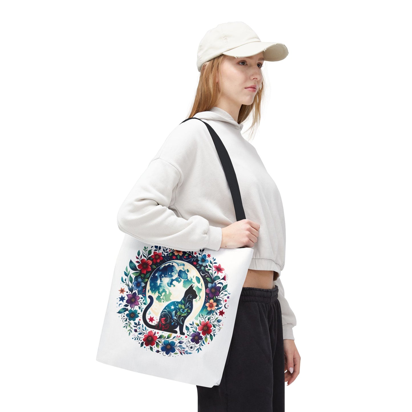 Lone Cat Under the Moon Tote Bag featuring a whimsical cat design, perfect for cat lovers. Made from durable polyester with boxed corners and reinforced handles, available in three sizes.
