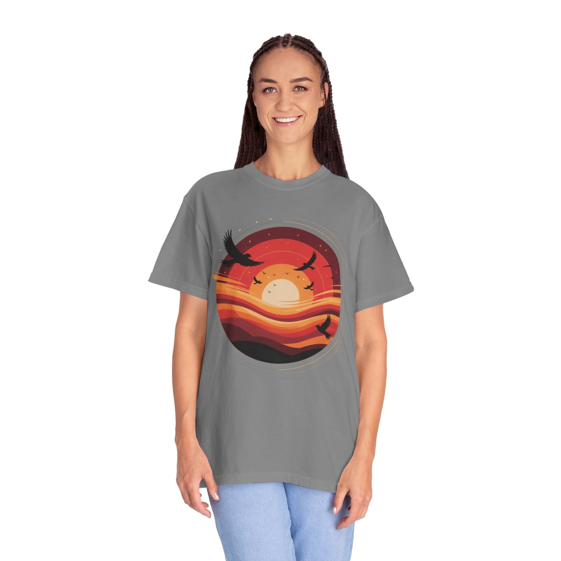 Sunset Energy Abstract T-Shirt showcases a dynamic sunset-themed design with concentric rings and silhouetted birds, made from soft, garment-dyed cotton for a vibrant, comfortable fit.