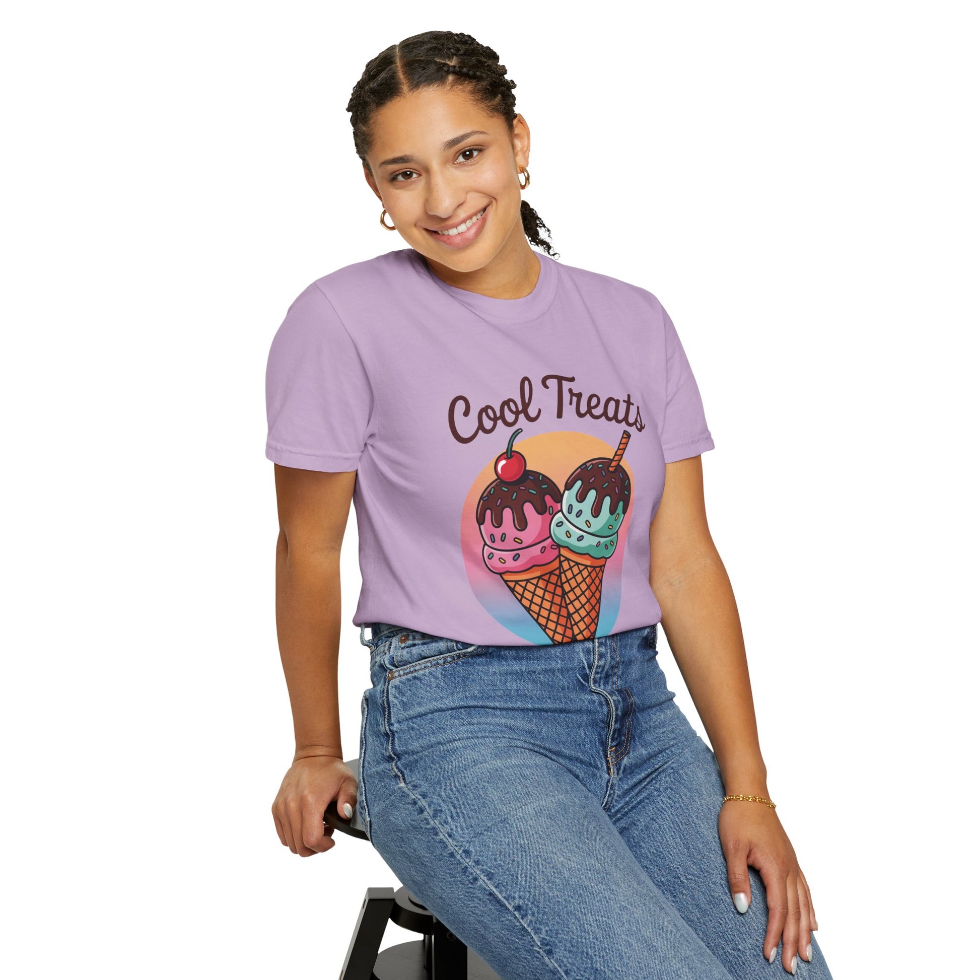 Ice Cream Cool Treats Comfort Colors Unisex T-Shirt modeled by a woman sitting on a stool, featuring playful ice cream cone prints, perfect for adding a fun, summery vibe to casual outfits.