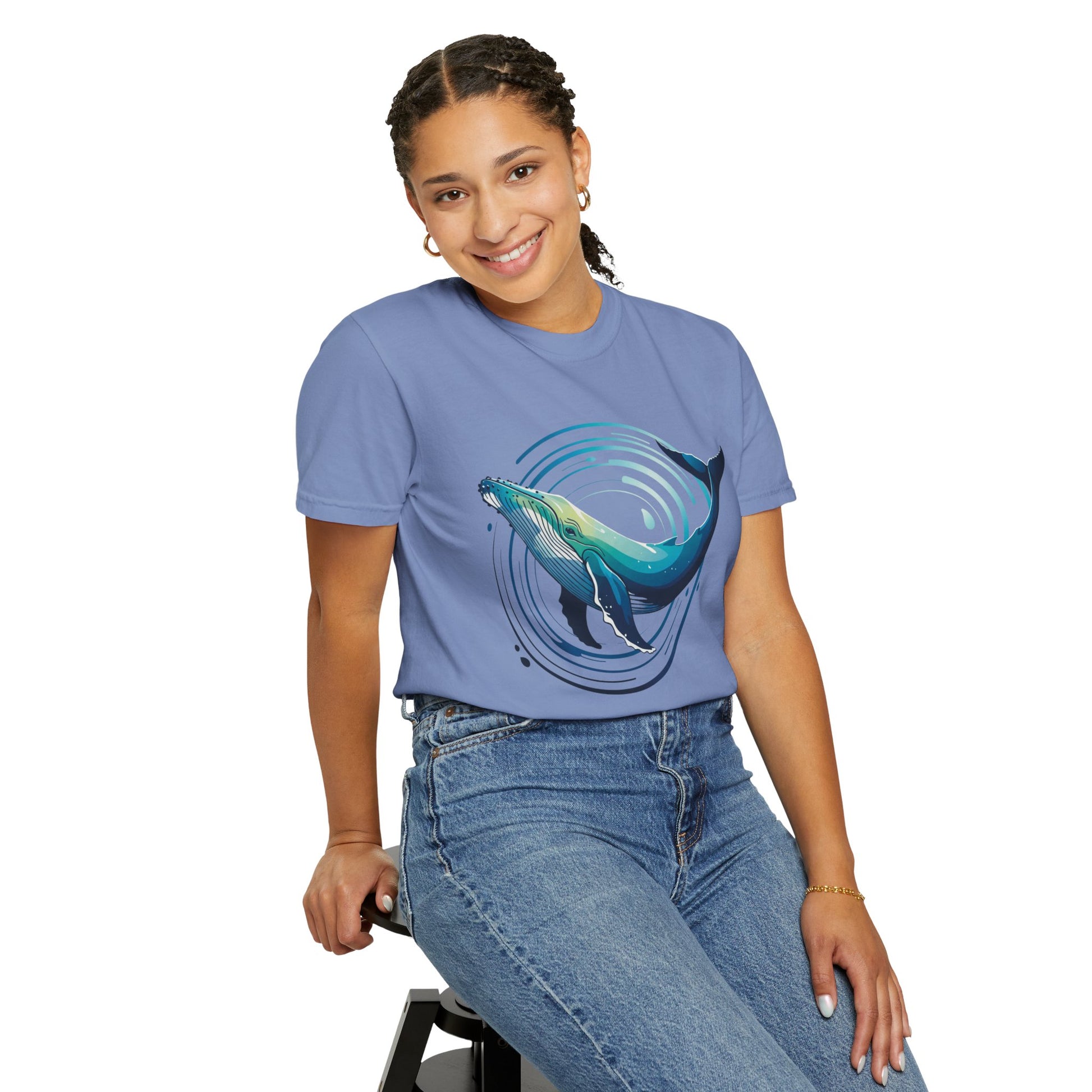 Ocean Wave with Humpback Whale Fin Design T-Shirt showcasing an abstract ocean scene with a stylized whale fin, enhanced by double-needle stitching and soft, garment-dyed US cotton for comfort and durability.