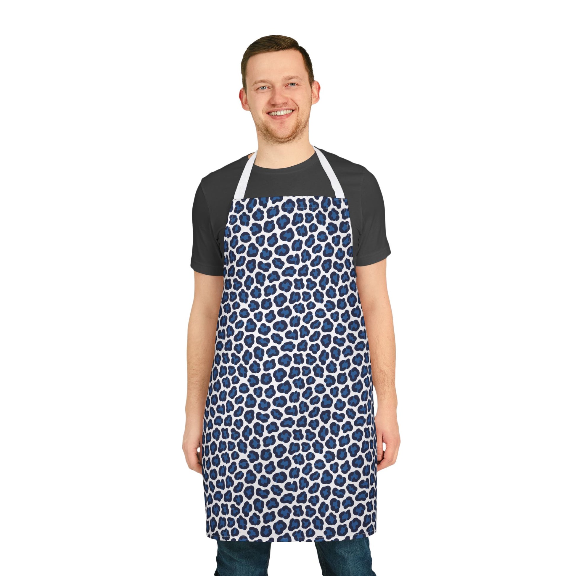 Apron, Cheetah Print: A man's smiling face above a vibrant cheetah print apron, showcasing its stylish design and comfortable fit, perfect for adding fun to cooking or crafting sessions.