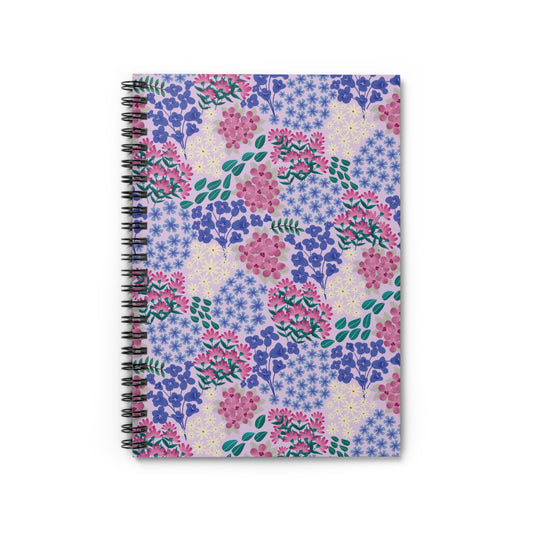 Floral Spiral Notebook with vibrant floral cover and sleek metal binding, perfect for creative note-taking. Compact and eco-friendly, it embodies FireBrook Essentials' joyful, uplifting design ethos.