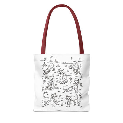 Yoga Cat Tote Bag featuring whimsical cat yoga poses, perfect for errands or gifting. Made from durable polyester with reinforced handles, offering both style and functionality for cat lovers and yoga enthusiasts.