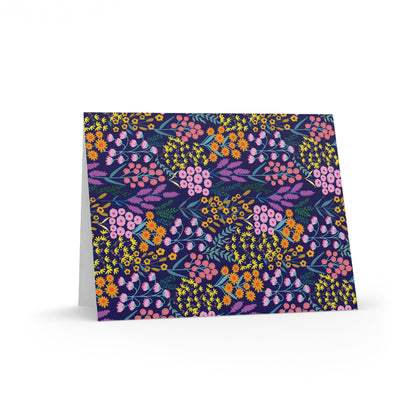 Floral Wildflower Greeting Cards — Pack of 8/16/24 feature vibrant, stylized floral patterns on a matte-finish, folded card, ideal for personal messages. Includes matching envelopes, enhancing joyful, uplifting communication from FireBrook Designs.