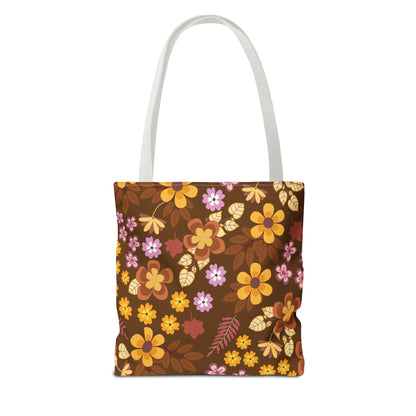 Floral Tote Bag with white handles features a retro-inspired floral pattern on a chocolate-brown background, showcasing autumnal tones, ideal for joyful summer outings and practical daily use.
