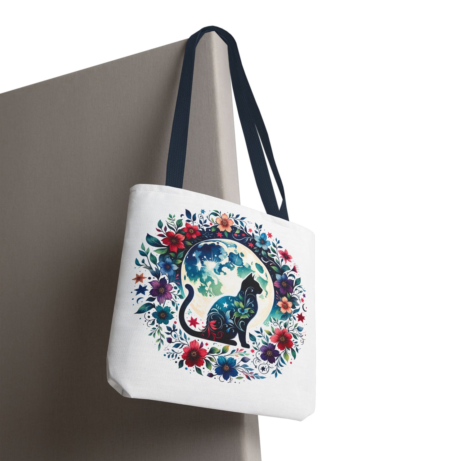 Lone Cat Under the Moon Tote Bag: A whimsical cat-themed tote with a playful design, ideal for errands or beach trips. Durable polyester, reinforced handles, and available in various sizes for versatile use.