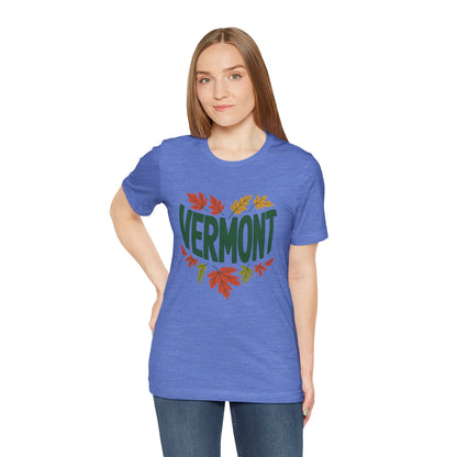 Vermont Love Bella+Canvas Unisex T-Shirt, showcasing a relaxed fit with ribbed knit collar and shoulder tape, ideal for outdoor enthusiasts. Perfect for layering, aligning with FireBrook Essentials' emphasis on comfort and style.