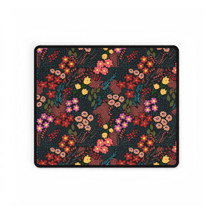 Desk Mat - Midnight Garden Floral Pattern features a dark field with vibrant floral motifs, ideal for nature enthusiasts. Its smooth surface and durable rubber base enhance your desk with colorful elegance.