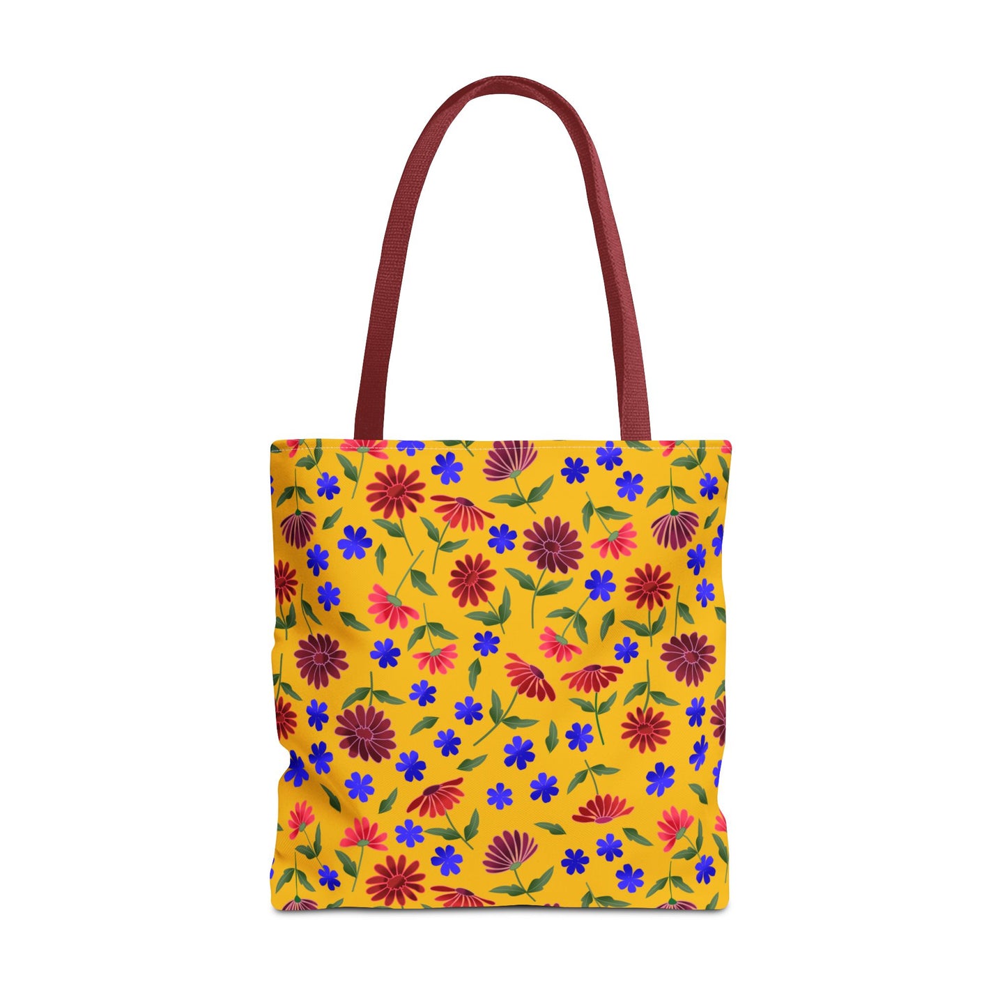 Golden Wildflower Tote Bag with burgundy handles features a vibrant mustard-yellow base adorned with red daisies and blue flowers, embodying FireBrook Essentials’ uplifting style. Ideal for versatile, joyful everyday use.