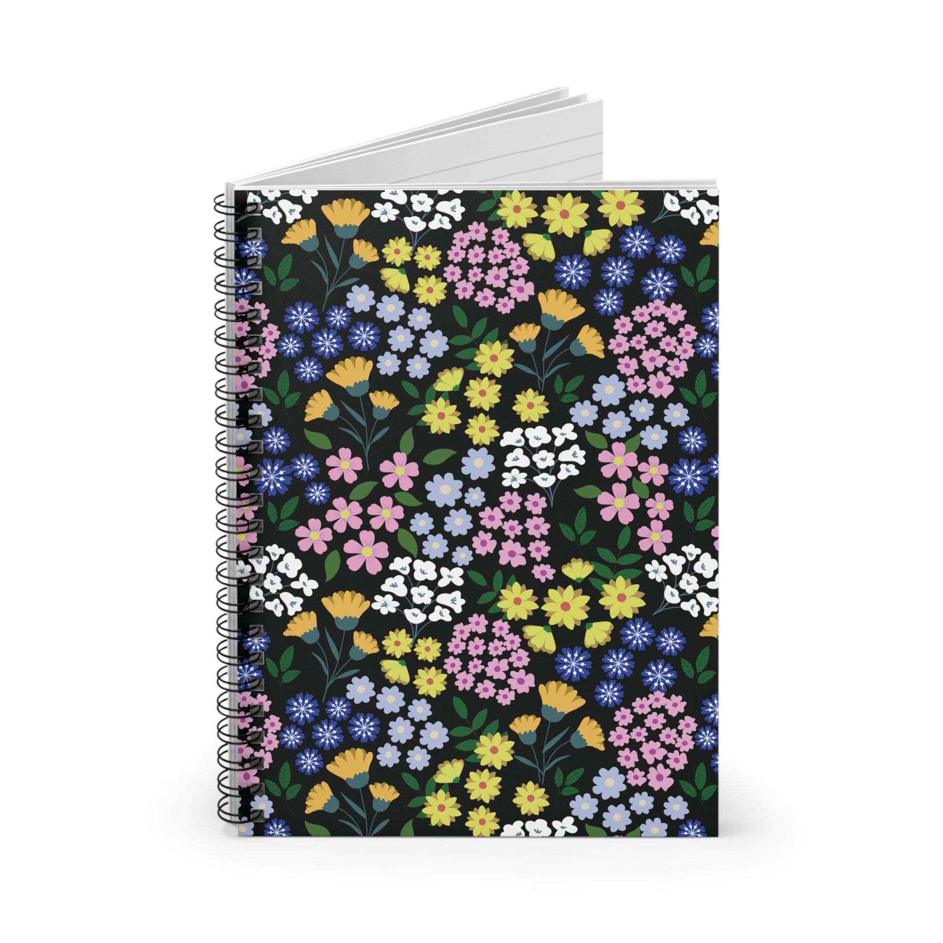 Floral Spiral Notebook features a vibrant floral pattern on a black cover, standing upright. Its sleek metal spiral binding and blank white pages invite creativity and organization, ideal for joyful, everyday use.