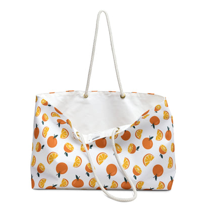 Weekender Bag Orange Pattern Design Travel Tote featuring playful orange motifs, rope handles, and a spacious T-bottom design, ideal for stylish travelers seeking a fun and vibrant accessory for weekend getaways.