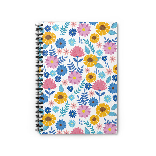 Floral Spiral Notebook with vibrant daisies and blue leaves on a white cover, featuring a black spiral binding. Perfect for creative journaling or note-taking, embodying FireBrook Designs' joyful and uplifting spirit.