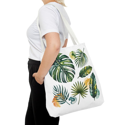Tropical Leaves Tote Bag, showcasing a vibrant leaf pattern, embodies a fresh, summery vibe. Ideal for beach outings or shopping, it combines style with durability, reflecting FireBrook Designs' commitment to joyful, uplifting products.
